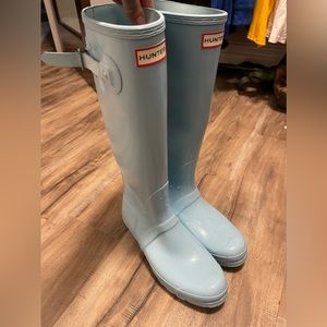 Baby blue tall hunter boots. Worn twice at most.